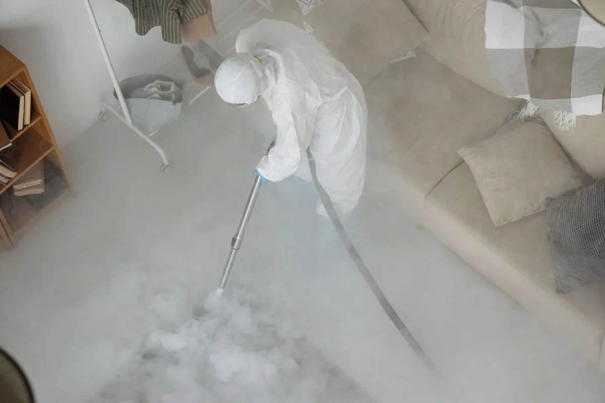 Biohazard cleanup technician in protective equipment, Lake Murray, San Diego, CA